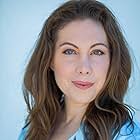 Cat Miggs as Guest Nina (ReelShort)